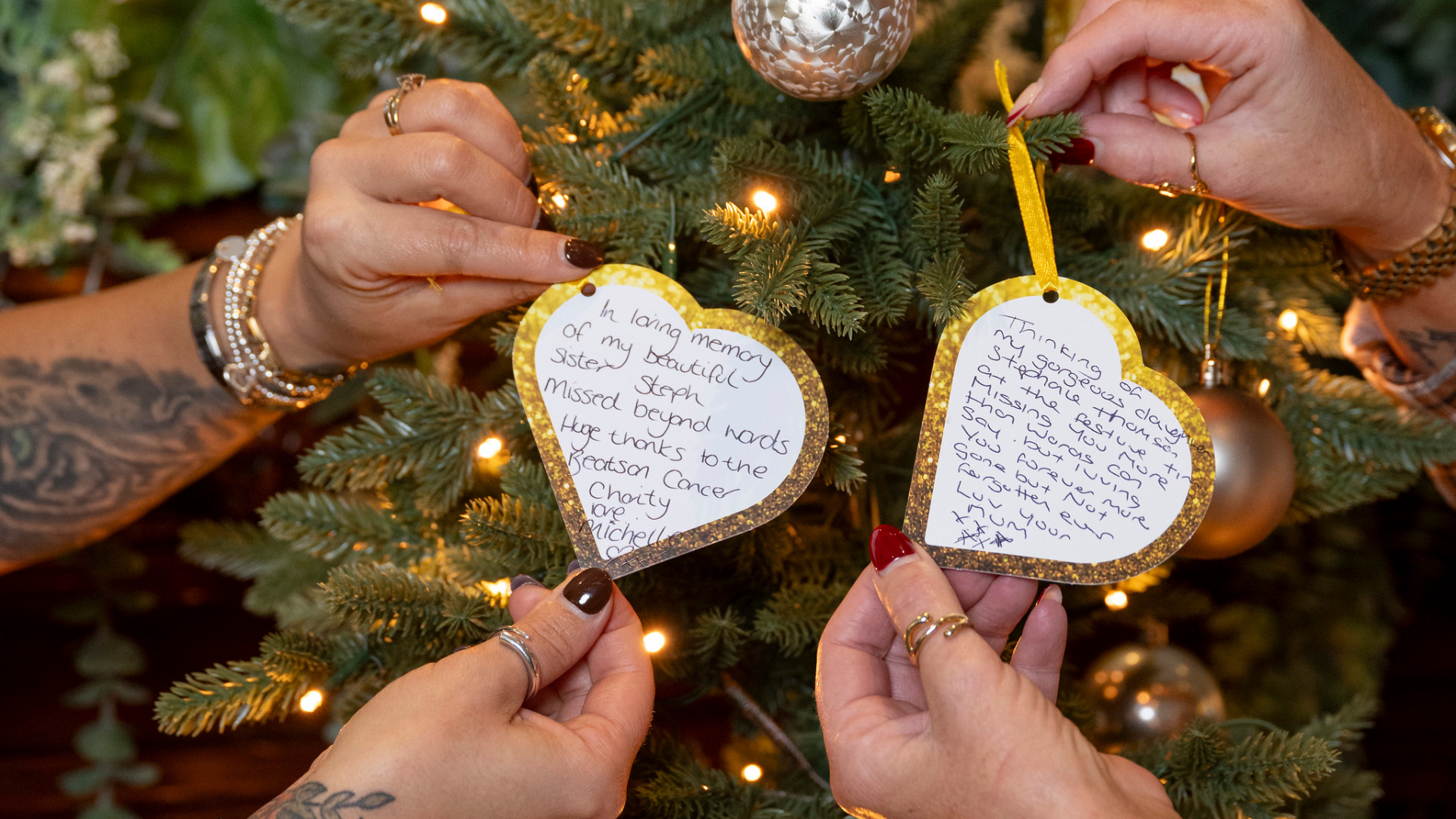 Yvonne & Michelle hanging their Beatson Baubles